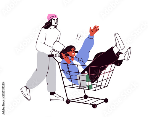 Happy funny girl friends with shopping cart. Playful female customers laughin...