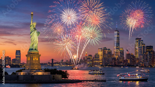 Fireworks Display Over New York City With the Statue of Liberty at Sunset