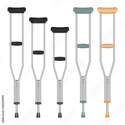 An array of adjustable crutches with different colored padding for mobility.