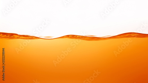 Close up of the Sunset Orange water level with a rippled texture on a white background.