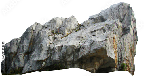 Foto A large, rugged gray rock formation with distinct textures and crevices, isolate