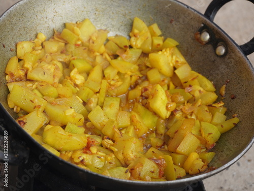 bottle gourd in a frying pan