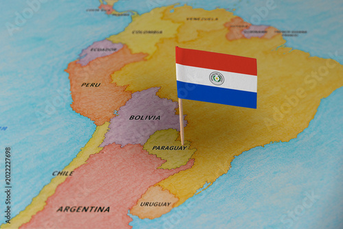 Cuadro en lienzo Paraguay flag pin marking Paraguay on South America map, travel destination con
