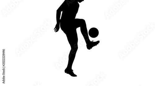 Silhouette of a soccer player juggling a ball isolated on white.