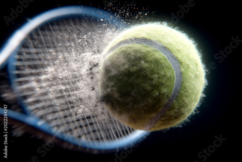 Explosive tennis ball impact on racket strings