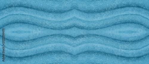 Schilderij op canvas Abstract swirling blue textured background with repeating wave patterns creating