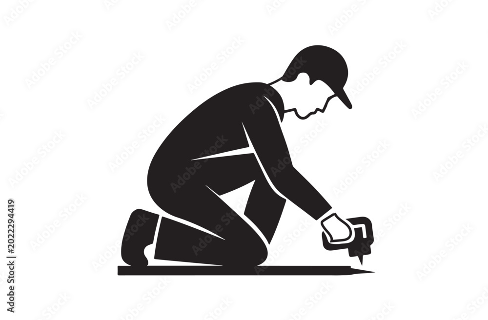 Fototapeta premium Worker Repairing Floor Surface Silhouette of Laborer Using Compact Repair Tool.