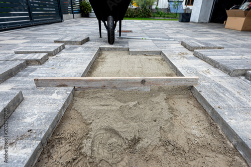 Paving work in progress, laying concrete slabs
