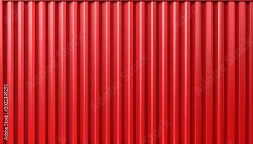 Corrugated red metal shipping container wall texture. Vertical steel panels background for industrial, logistics, and transportation design. Bright red metallic surface with grunge details.
