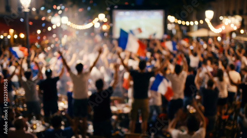 Crowded Fans Cheering with Flags at Outdoor Cafe Screen Watching Football in France Intentationally blurred Celebration Background