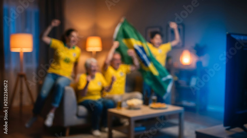 Brazilian football fans cheering victory in living room Intentationally blurred background for sports fan culture and celebration