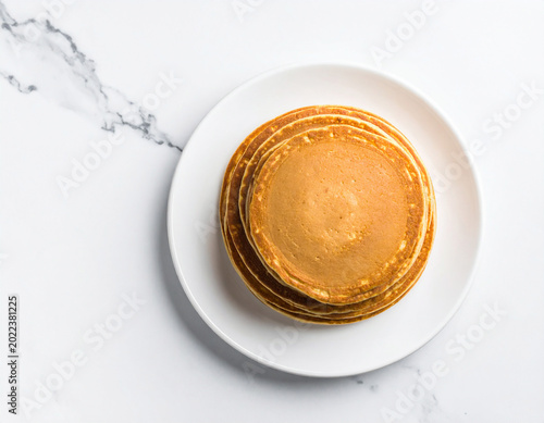 pancakes, stacked on a plate