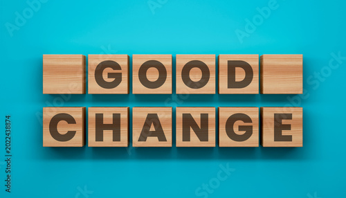 Foto Good Change Blocks: Wooden blocks spell out GOOD CHANGE against a vibrant backdrop, symbolizing positive transformation, growth, and the power of progress