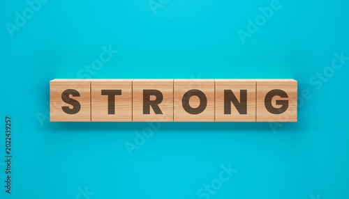Foto Strong Wooden Blocks: The word STRONG is spelled out on wooden blocks