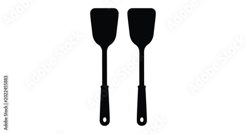 Foto spatula silhouettes on white background kitchen utensil pair