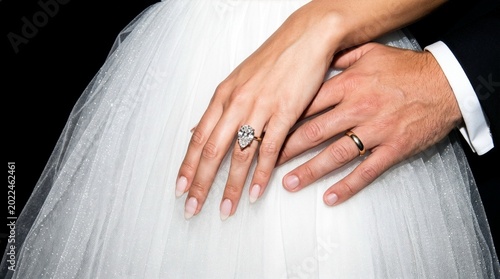 Canvastavla High-fashion editorial close-up of a bride's hand with a pear-cut diamond ring a