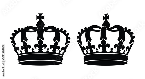 Schilderij op canvas Two ornate royal crowns in black silhouette