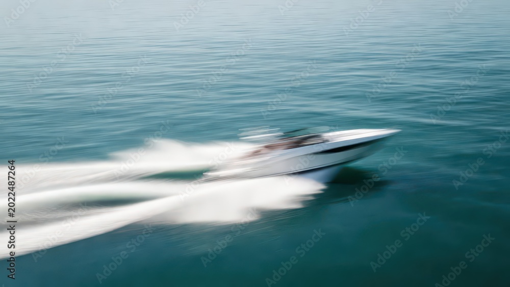 Naklejka premium White motorboat speeding across calm blue water, leaving a white wake, motion blur