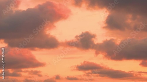 Beautiful Orange Yellow Tropical Stormy Sunset Sky Rain Clouds and Sun Time Lapse Horizon. Colored Cloudy Sky Timelapse.