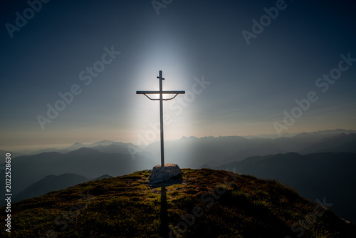 Metal cross on the mountain top