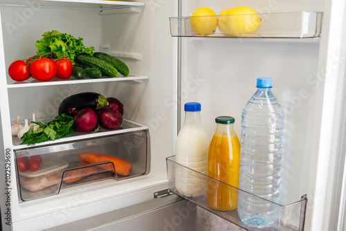 A fridge full of fruits and vegetables for healthy dieting