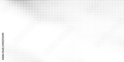 Tableau sur toile Black halftone dots create a smooth gradient fading upward into a white background, forming a clean abstract texture