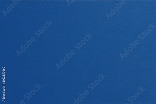 Plain solid blue textured backdrop. Smooth fabric surface, no objects present. Versatile background for product shots, portraits or graphic design projects.