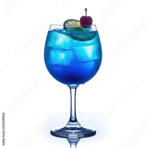 Blue cocktail drink in a glass with ice and cherry.
