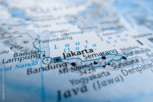 Map of Jakarta styled in grey color. Selective focus on label, close-up view