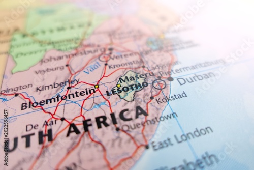 Map of Lesotho with flare from top right corner. Selective focus on label, close-up view
