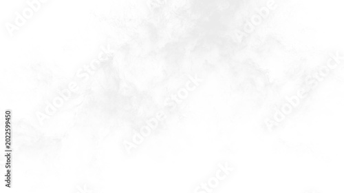 Fotografie Clouds float in a gentle manner across a clear sky during daytime illumination w