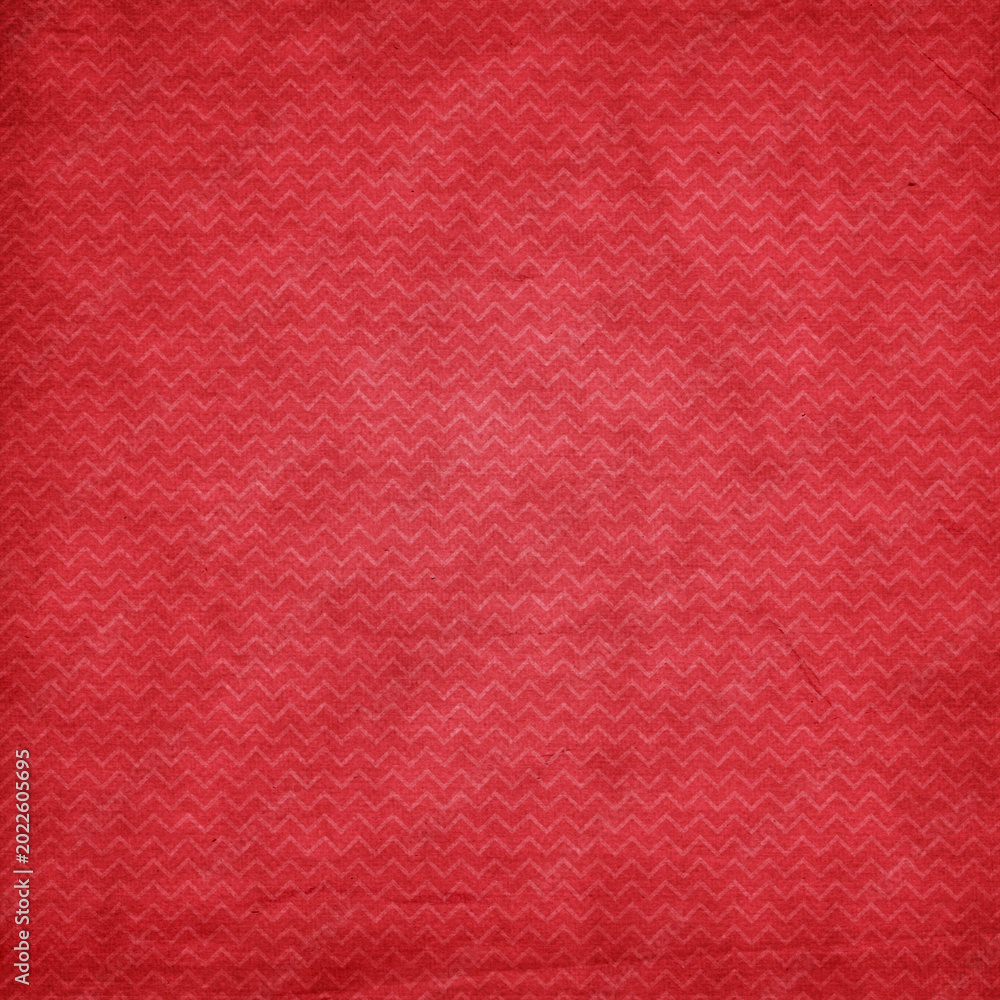 Fototapeta premium Vintage red textured chevron seamless pattern with subtle zigzag details. Grunge geometric background for wallpaper, textile and retro craft design.