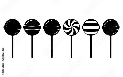 Black and white lollipops on with various designs and patterns