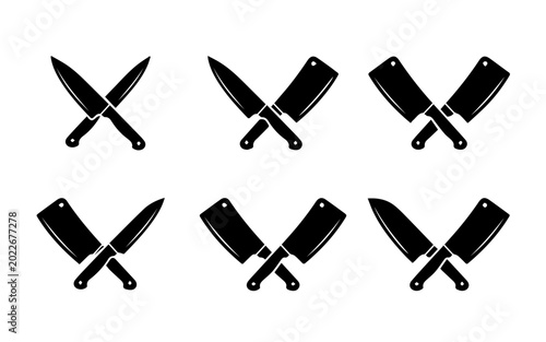 Black kitchen knives and cleavers crossed over each other