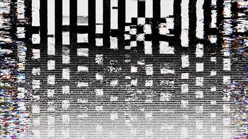 Glitchy screen with distorted pixels.