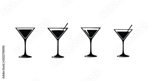 Four martini glasses with and without straws black silhouette