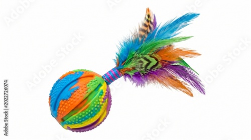 Vibrant rubber ball adorned with feathers for pets, isolated on a transparent background.

