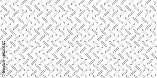 Shiny silver diamond plate metal texture with a repeating industrial steel pattern for construction design