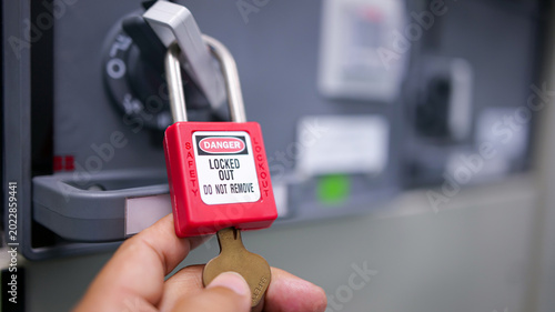 LOTO safety lock, red danger padlock, equipment lockout, maintenance protection, energy isolation device
