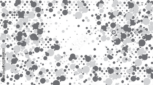 Obraz na plátně Abstract pattern of scattered gray and white circles.
