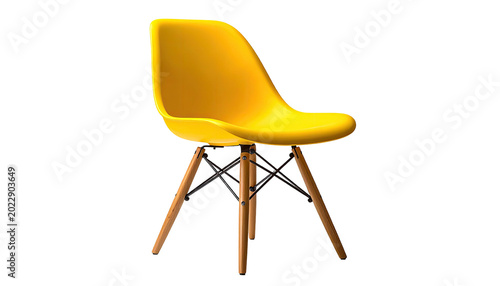 A vibrant yellow modern chair on a black background, side view