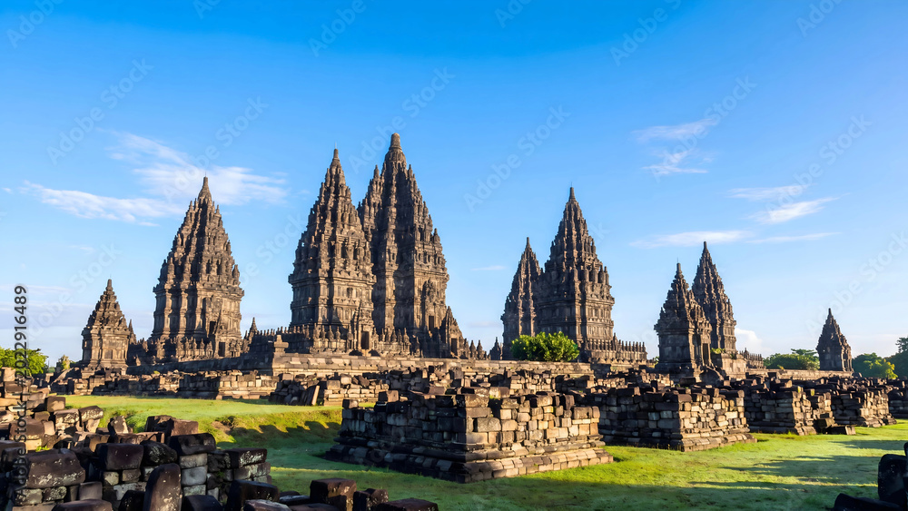 Fototapeta premium Prambanan temple complex towers under blue sky