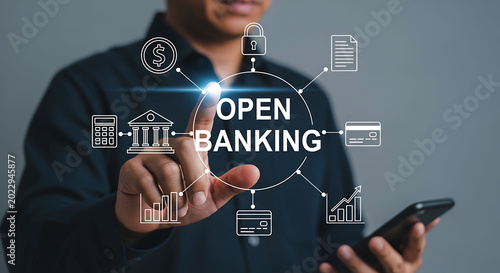 Businessman touching open banking virtual network with digital financial icons