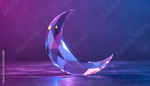 Crystal crescent moon with purple and blue light reflections on dark background