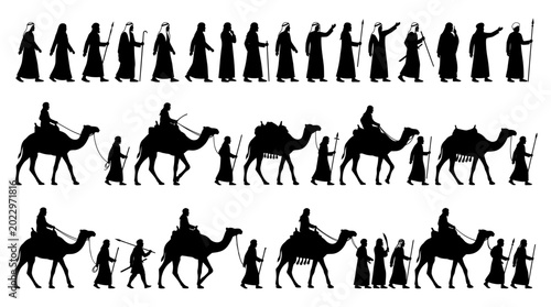 Valokuva Silhouette collection of traditional desert travelers walking and riding camels