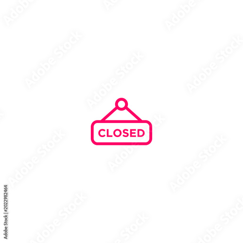 Simple pink 'CLOSED' sign hanging from a hook, symbolizing business hours or unavailability