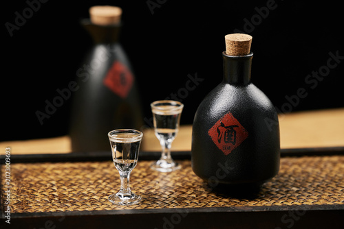 Bild auf Leinwand Traditional Chinese Baijiu in Ceramic Bottles