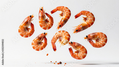 Assortment of Cooked Shrimp Falling in Air