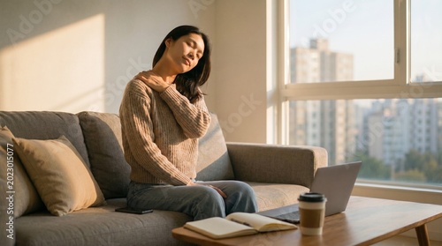 Woman Stretching Neck After Long Day Working From Home