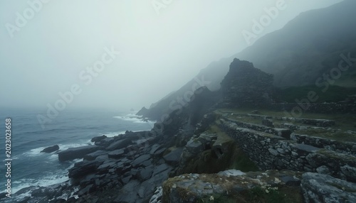 Sea fog surrounding abandoned ancient coastal stone ruins